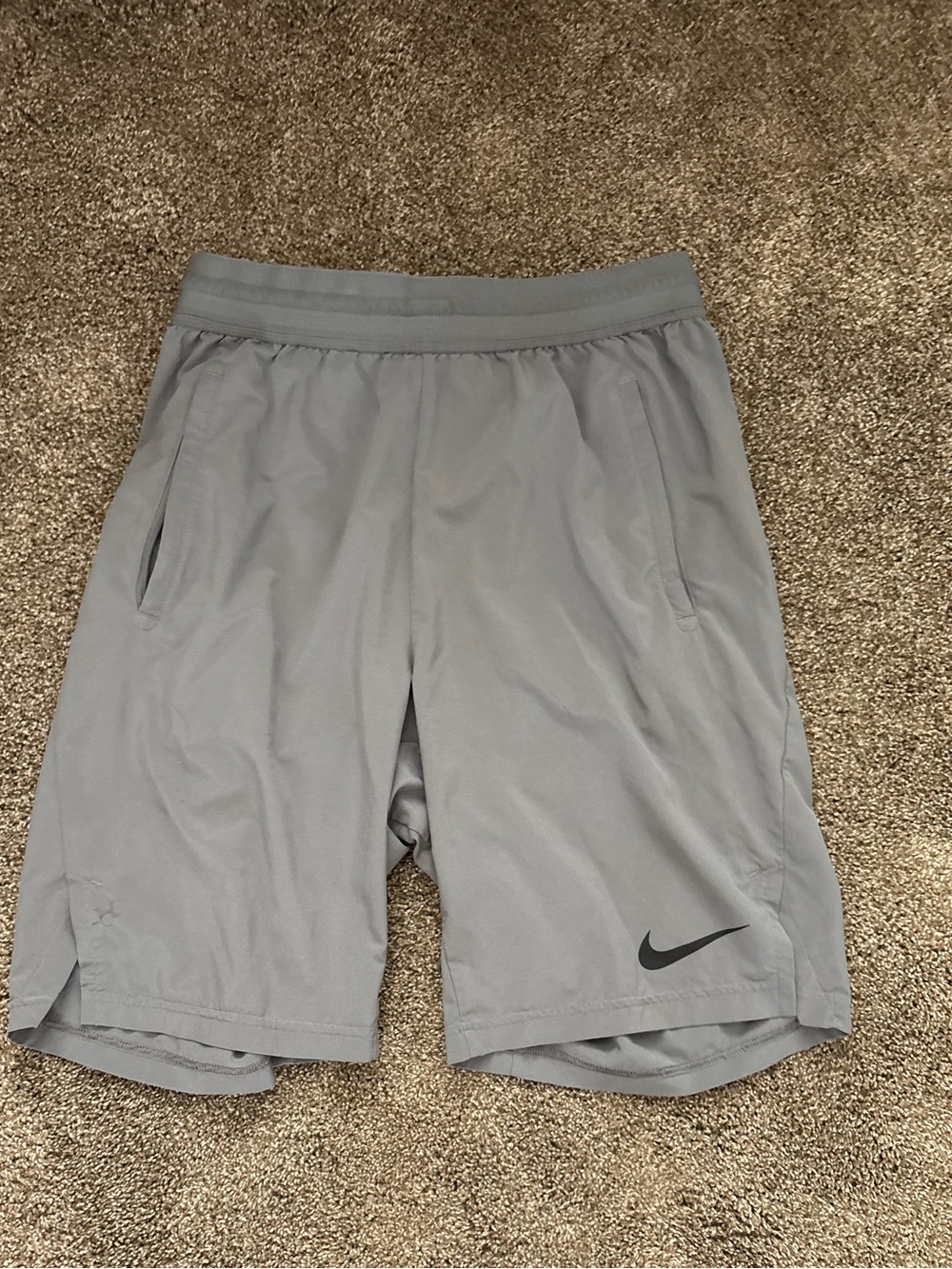 Nike Dri-Fit Men's Light Gray 7” Athletic Training Shorts with Black Swoosh